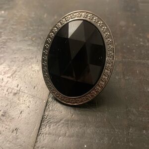 Elegant Black Oval Ring with Silver Detailing